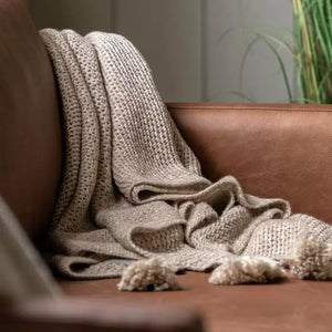 KNITTED TASSEL THROW | NATURAL